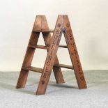 A vintage style wooden step ladder
