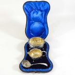 A Victorian silver and gilt cream set