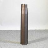 A brass artillery shell case stick stand