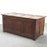 An 18th century carved oak coffer