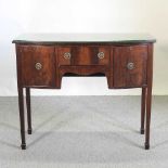 A Regency style mahogany bow front sideboard