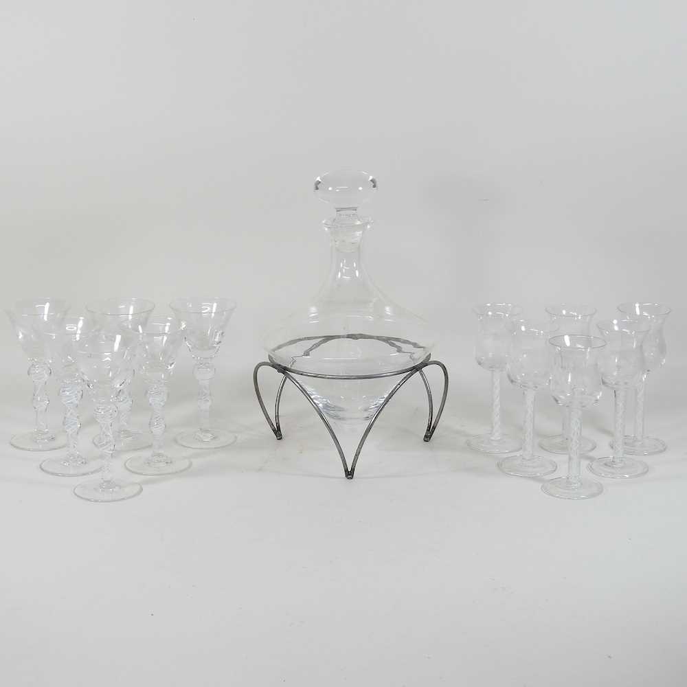 A collection of airtwist and etched drinking glasses