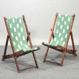 A pair of child's folding deck chairs