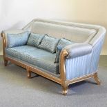 A modern pale blue upholstered sofa