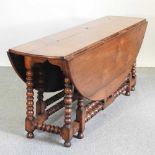 An 18th century style oak wakes table