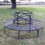 A black painted iron circular tree bench