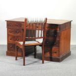 A Victorian oak pedestal desk