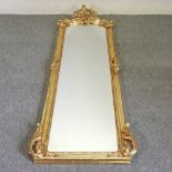 A modern ornate gilt framed pier mirror