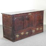 An 18th century oak mule chest