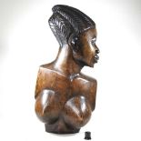 A mid 20th century African carved portrait bust