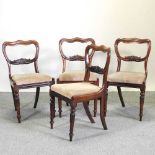 A set of four William IV rosewood kidney back dining chairs