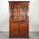 A 19th century mahogany cabinet bookcase