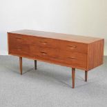 A 1960's teak effect dressing chest