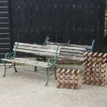 A cast and wrought iron garden bench