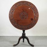 A 19th century carved oak occasional table