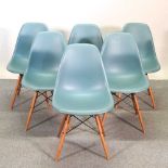 A set of six Vitra Eames plastic moulded dining chairs