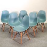 A set of six Vitra Eames moulded plastic dining chairs