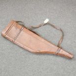 An early 20th century brown leather gun case