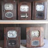 A collection of five early 20th century wall clocks