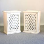 A pair of cream painted cabinets