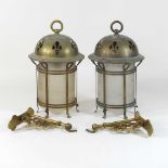 A pair of Arts and Crafts pierced brass lanterns