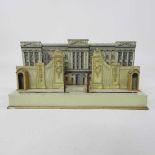 A tin plate clockwork model of Buckingham Palace