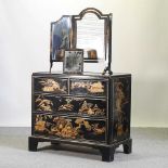 A 20th century decorated chest of drawers