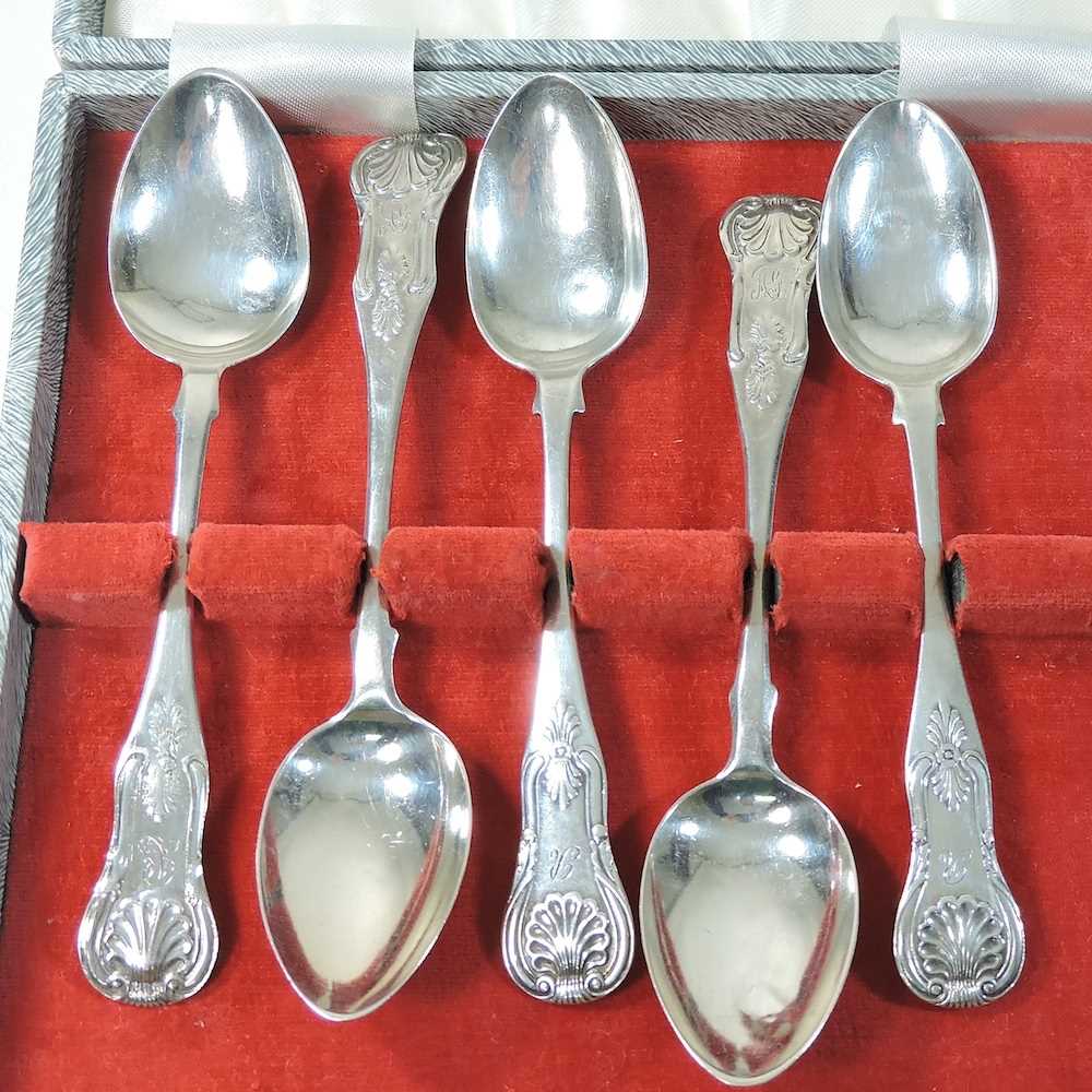 A collection of five silver Queens pattern teaspoons