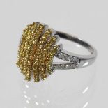 A 9 carat gold white and yellow diamond ring