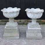 DAY TWO - A pair of cast stone garden urns