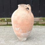 A terracotta olive jar
