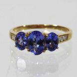 An 18 carat gold and tanzanite ring