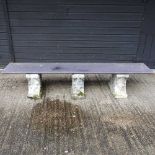 A black slate garden bench