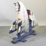 An F H Ayres style painted wooden rocking horse