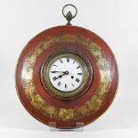 A 19th century red tole wall clock