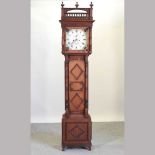 A late 19th century walnut cased longcase clock