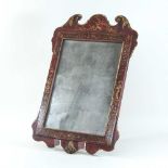 An 18th century fret carved wall mirror