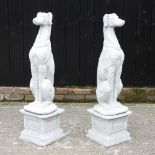 A pair of reconstituted stone lurchers