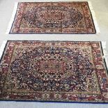 A pair of Persian rugs
