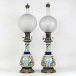 A pair of late 19th century majolica oil lamps