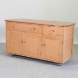 A mid 20th century Ercol style sideboard