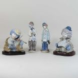 A pair of Lladro figures of clowns