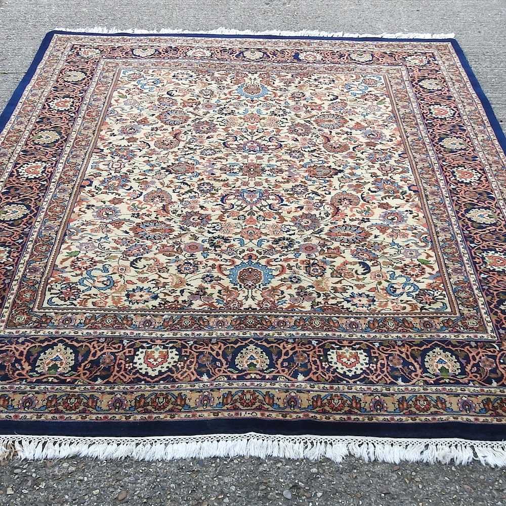 A large Indian carpet, with all over floral design