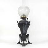 A 19th century spelter oil lamp