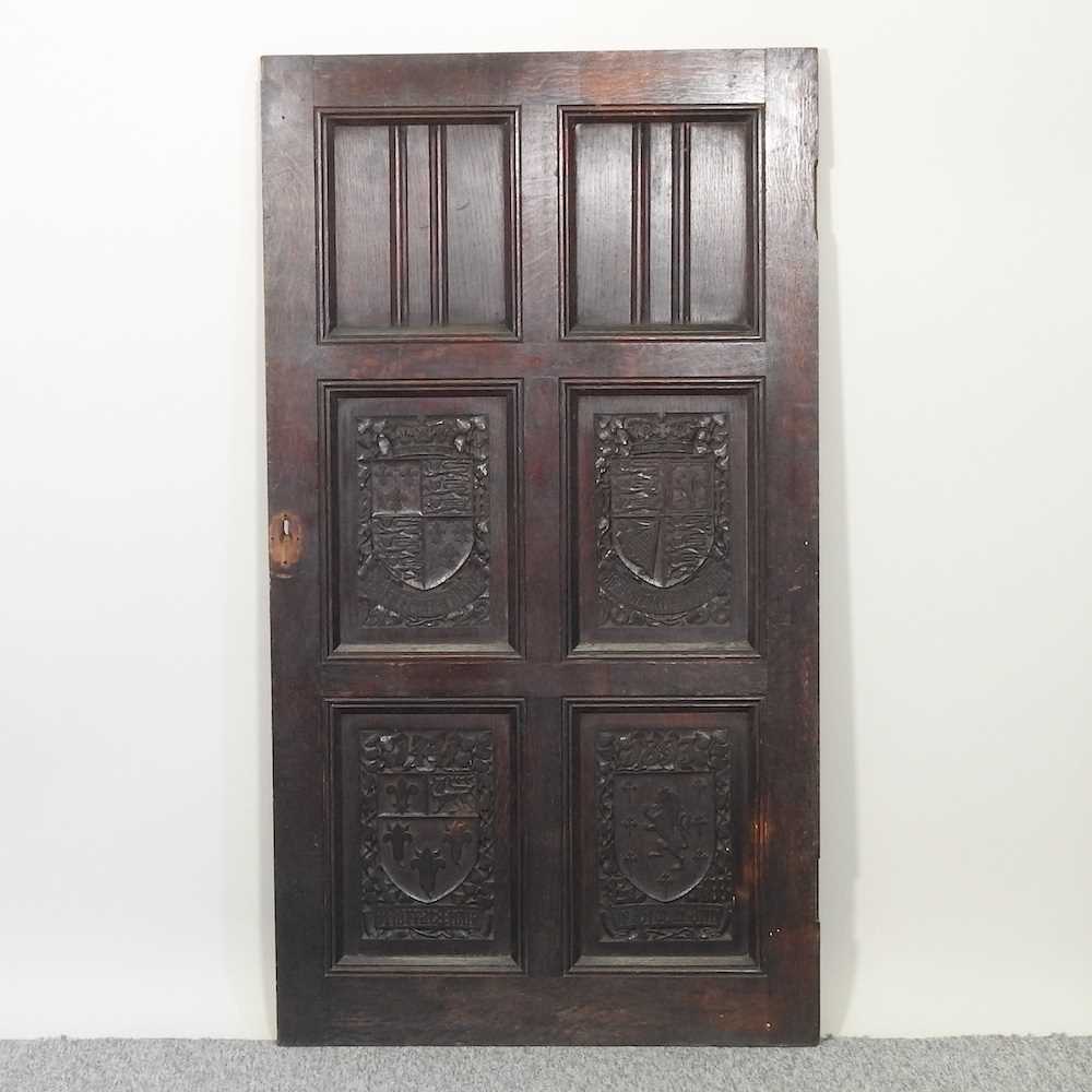 An early 20th century continental carved oak door