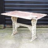 A 19th century painted cast iron garden table