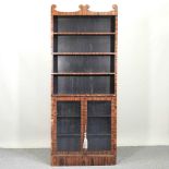 A good Regency rosewood standing open bookcase