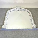 A white painted carved overmantel mirror