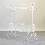 A white painted metal towel rail