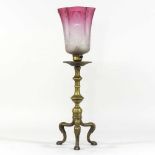 An Art Nouveau brass table lamp